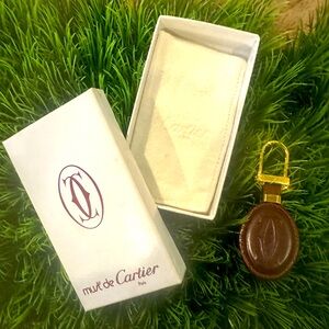 Cartier leather bag charm